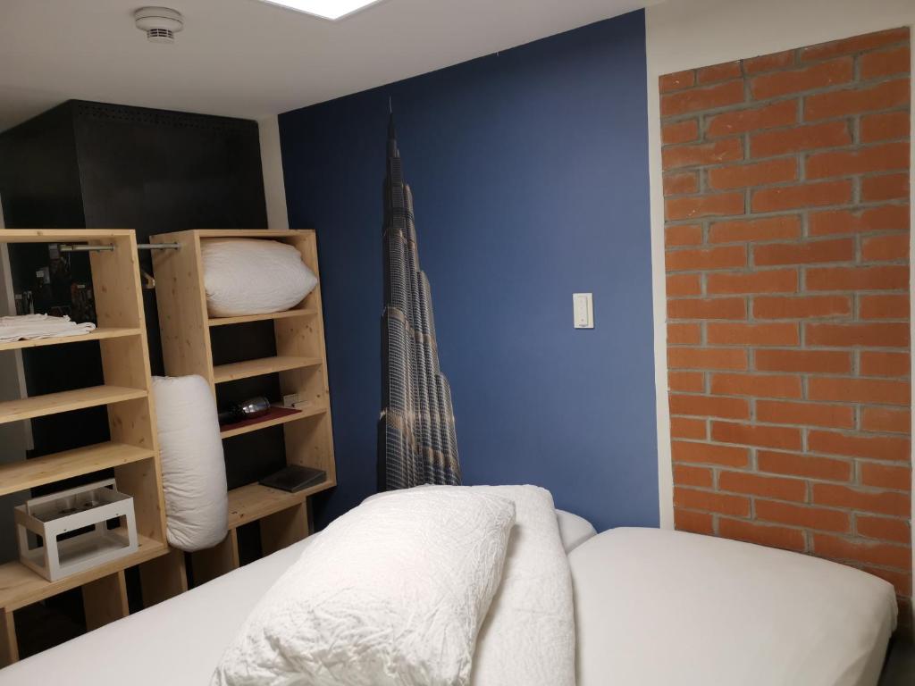 Postel nebo postele na pokoji v ubytování Hotel16 by Messe & Stadion Suisse in Minuten & Late Check-in