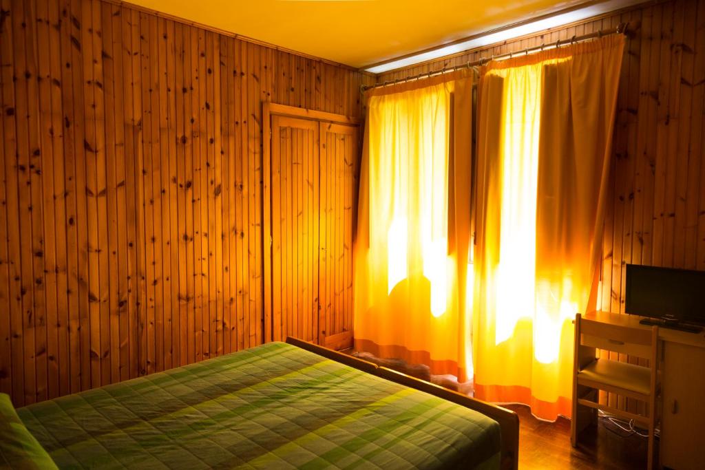 Postel nebo postele na pokoji v ubytování Albergo Centrale Scanno