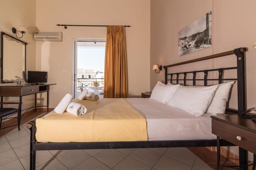 Postel nebo postele na pokoji v ubytování Maistrali Hotel Zante