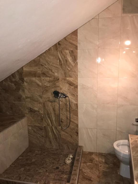 Kúpeľňa v ubytovaní Metamorfosis Apartments