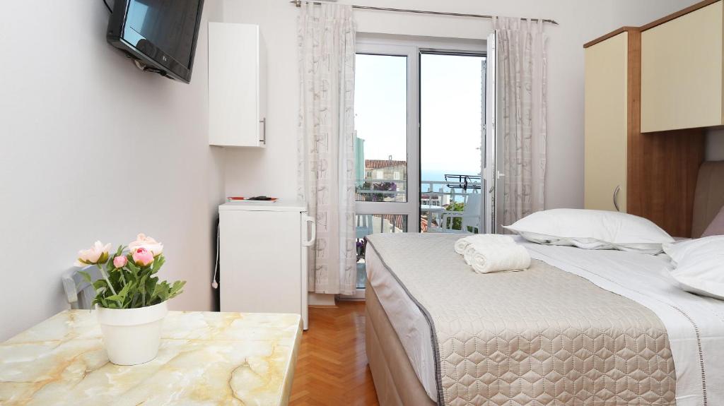 Postel nebo postele na pokoji v ubytování Villa Zora