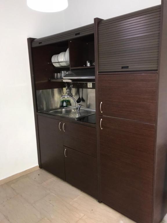 Kuchyňa alebo kuchynka v ubytovaní Metamorfosis Apartments
