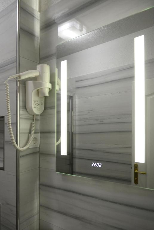 Koupelna v ubytování Riva Rooms