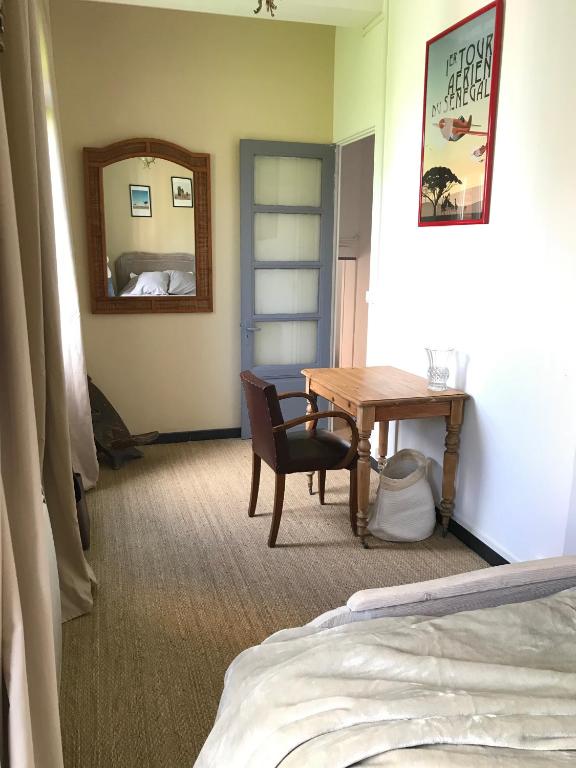 Postel nebo postele na pokoji v ubytování Le Moulin Sainte Marie, chambres d'hôtes et Gîte