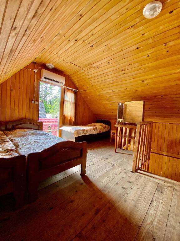 Postel nebo postele na pokoji v ubytování Cabins in Magnetiti, Ureki