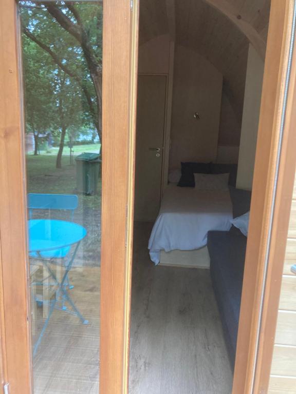 Postel nebo postele na pokoji v ubytování Camping Vila de Sarria
