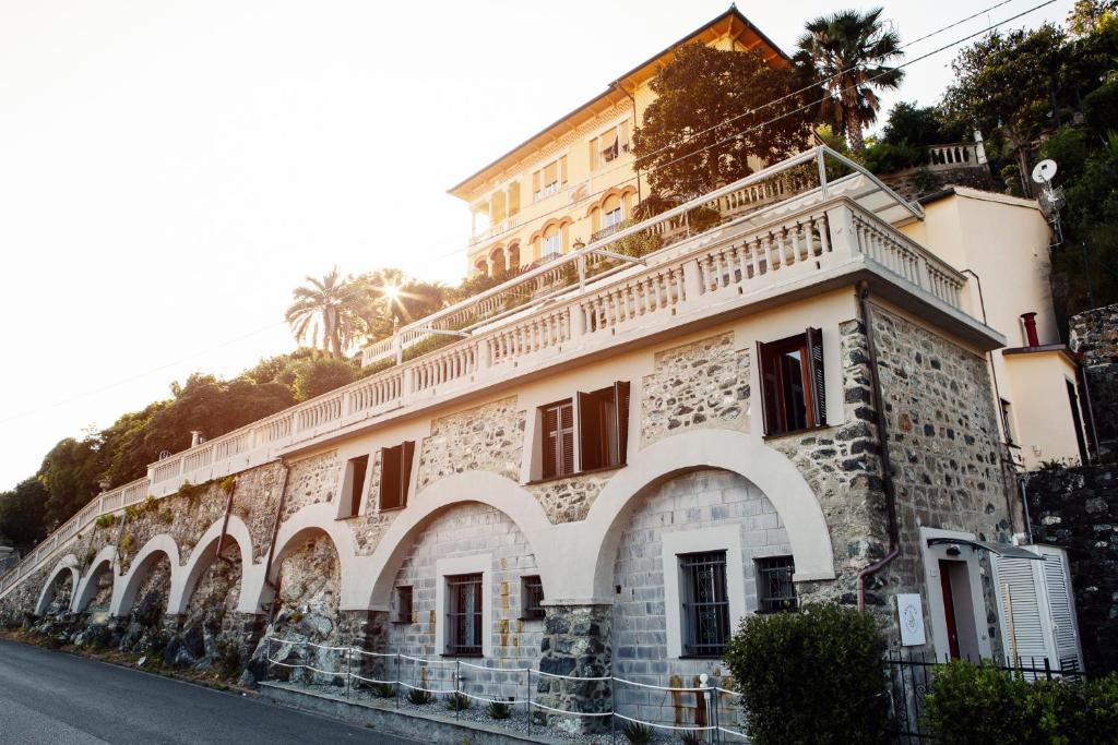 an old building on the side of a street at Bellevue - Rooms & Suites in Levanto