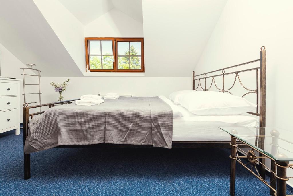 Postel nebo postele na pokoji v ubytování Hotel Ostende