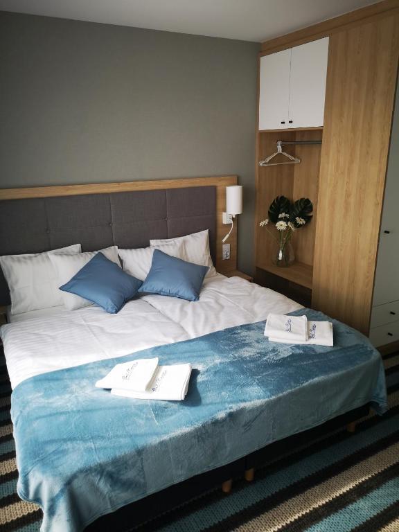 Posteľ alebo postele v izbe v ubytovaní Apartament 425 - Bel Mare Międzyzdroje
