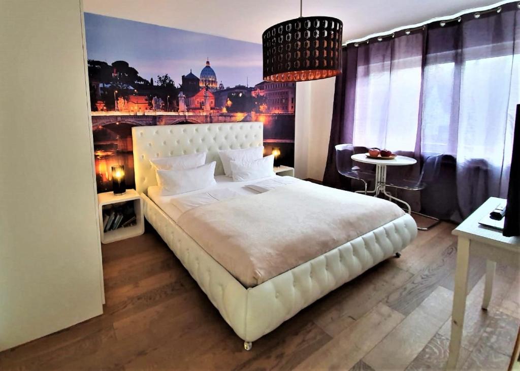 Giường trong phòng chung tại Studio Rome in der Altstadt