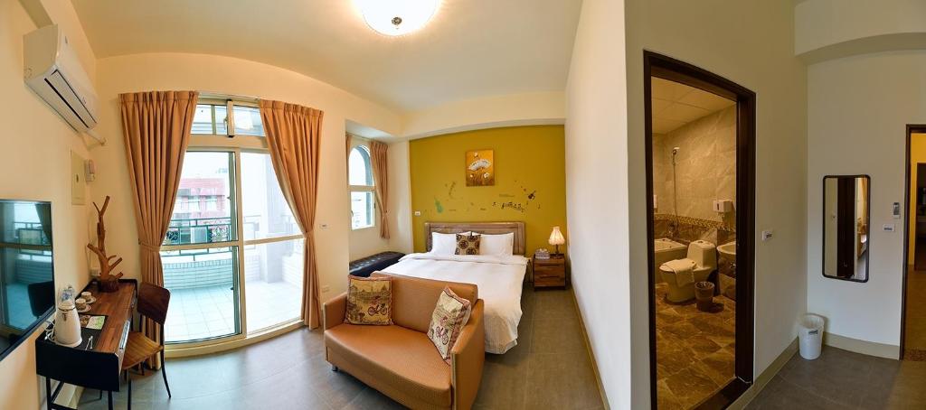 Postel nebo postele na pokoji v ubytování Ruisui Style B&B
