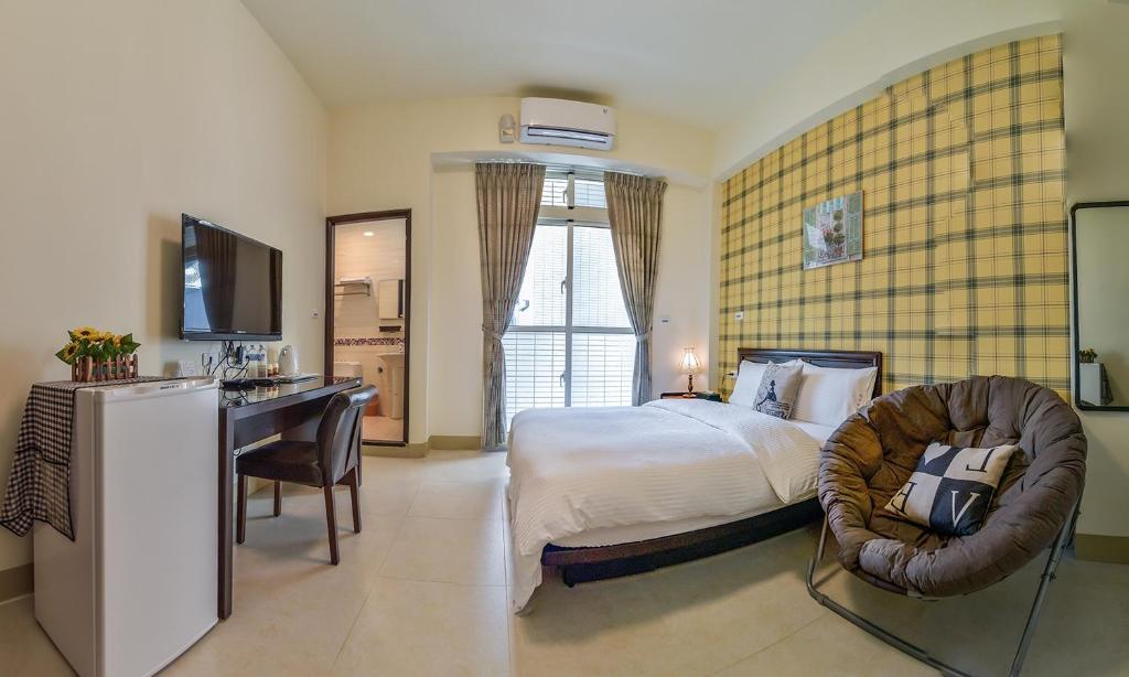 Postel nebo postele na pokoji v ubytování Ruisui Style B&B