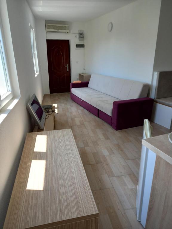 Postel nebo postele na pokoji v ubytování MD APARTMANI CANJ
