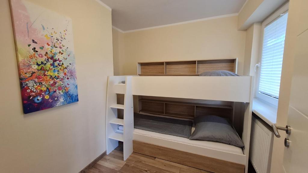 Posteľ alebo postele v izbe v ubytovaní Ferienwohnung Sevim