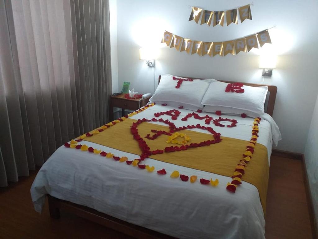 Postel nebo postele na pokoji v ubytování Hotel Tuvalu