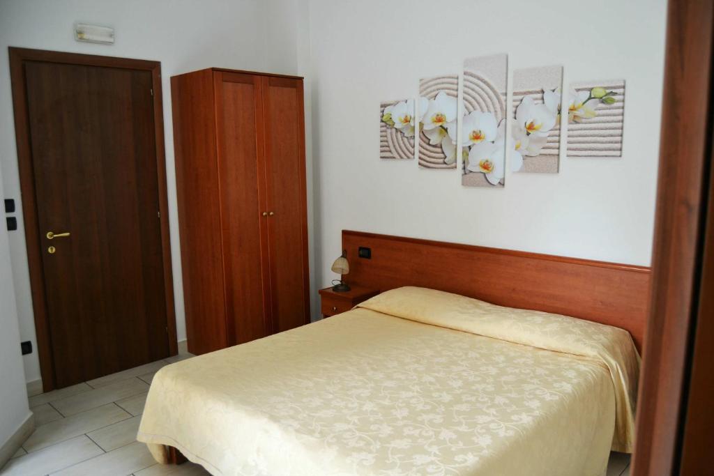 Postel nebo postele na pokoji v ubytování B&B Centrale Affittacamere