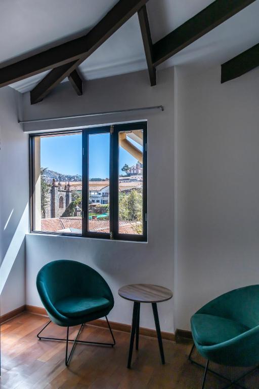Posezení v ubytování Hostal & Apartments El Triunfo