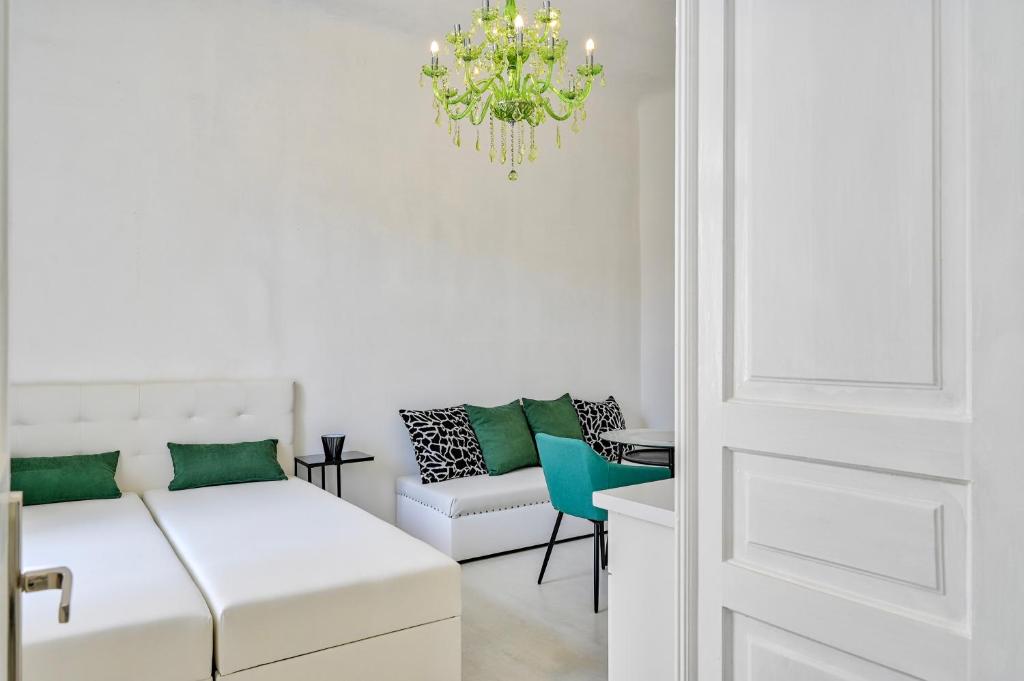 Katil atau katil-katil dalam bilik di Collins Emerald Center