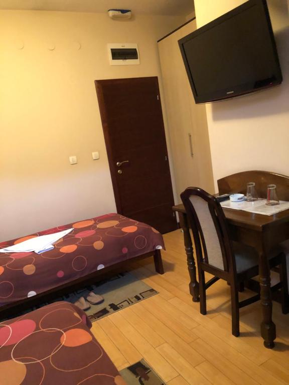 Postel nebo postele na pokoji v ubytování Hotel Royal