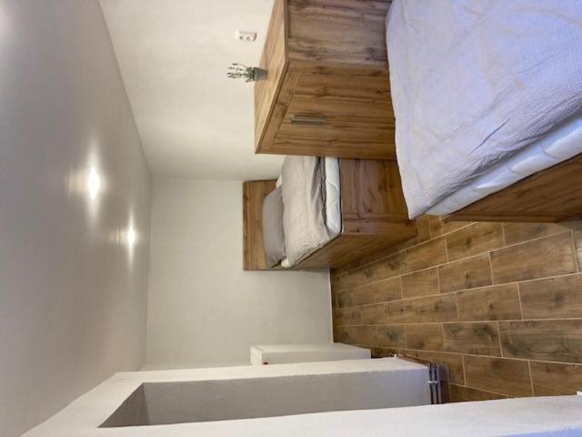 Łóżko lub łóżka w pokoju w obiekcie Apartmány Kurojedy