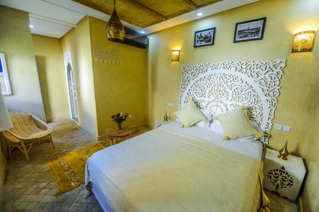 Postel nebo postele na pokoji v ubytování Riad Milouda