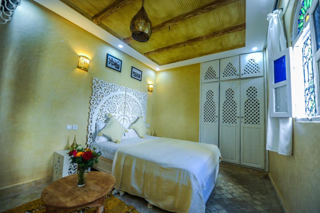 Postel nebo postele na pokoji v ubytování Riad Milouda