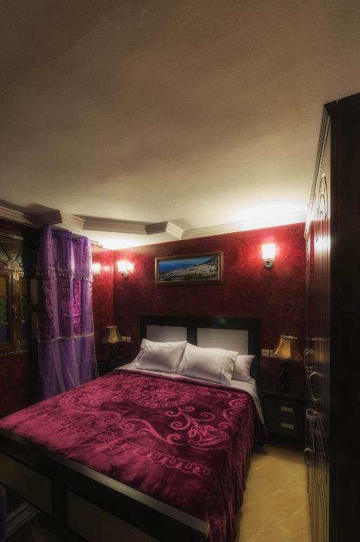 Postel nebo postele na pokoji v ubytování Résidence Hoteliére Chez Aziz