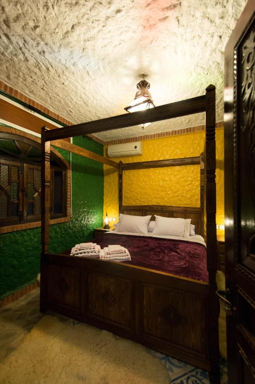 Postel nebo postele na pokoji v ubytování Résidence Hoteliére Chez Aziz