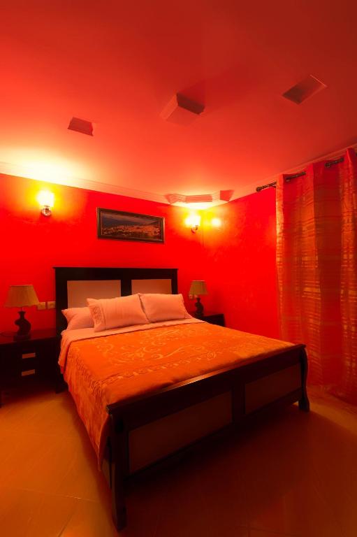 Postel nebo postele na pokoji v ubytování Résidence Hoteliére Chez Aziz