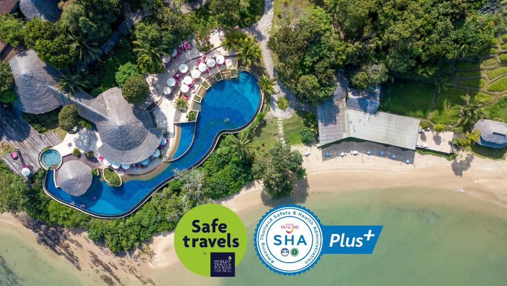 an aerial view of a resort with a beach at Koh Yao Yai Village in Ko Yao Yai