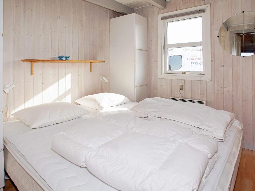 Postel nebo postele na pokoji v ubytování Seaside Charm in Bork Havn - By Traum Ferienwohnungen