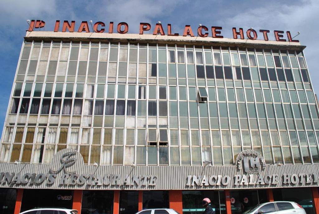 a large building with a sign on top of it at Inácio Palace Hotel in Rio Branco