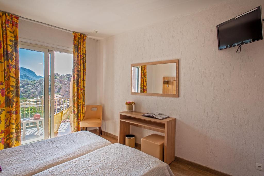 TV a/nebo společenská místnost v ubytování Hotel Kalliste