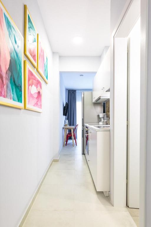 Kuchyň nebo kuchyňský kout v ubytování Art Central Suites