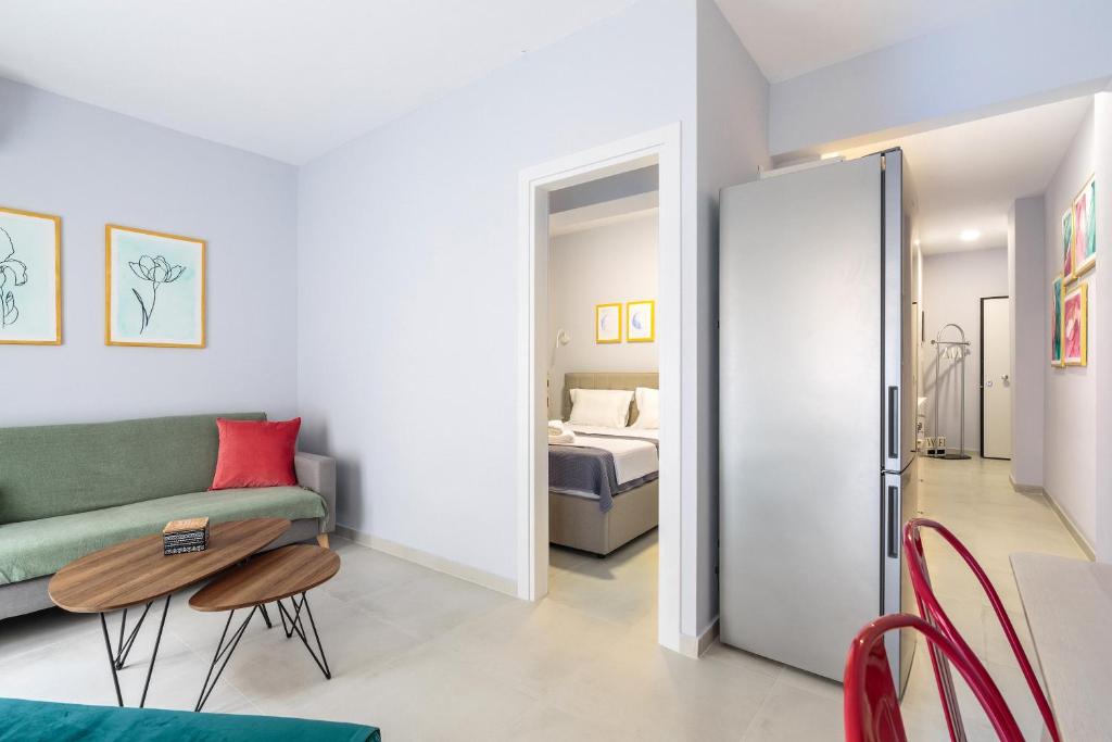Postel nebo postele na pokoji v ubytování Art Central Suites