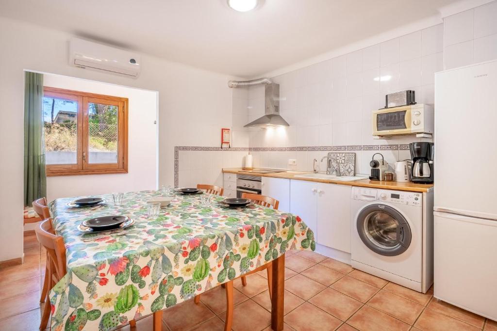 Kuchyň nebo kuchyňský kout v ubytování Santa Eulalia