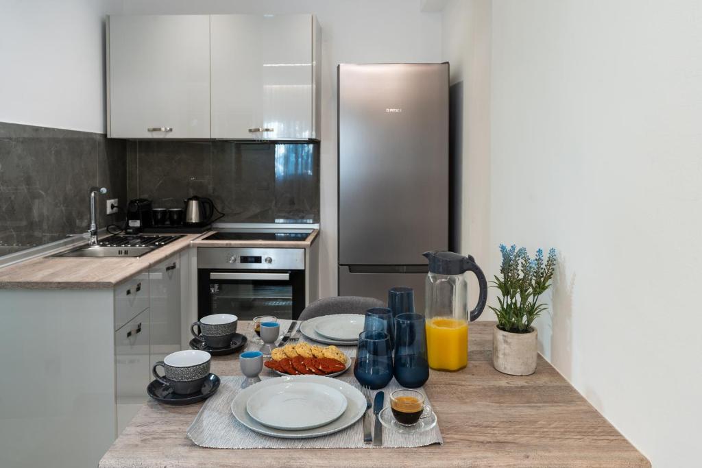 Kuchyň nebo kuchyňský kout v ubytování POUNEDES LUXURY SUITES