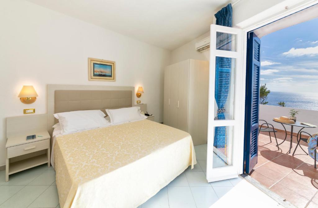 Cama o camas de una habitación en Hotel Grazia alla Scannella