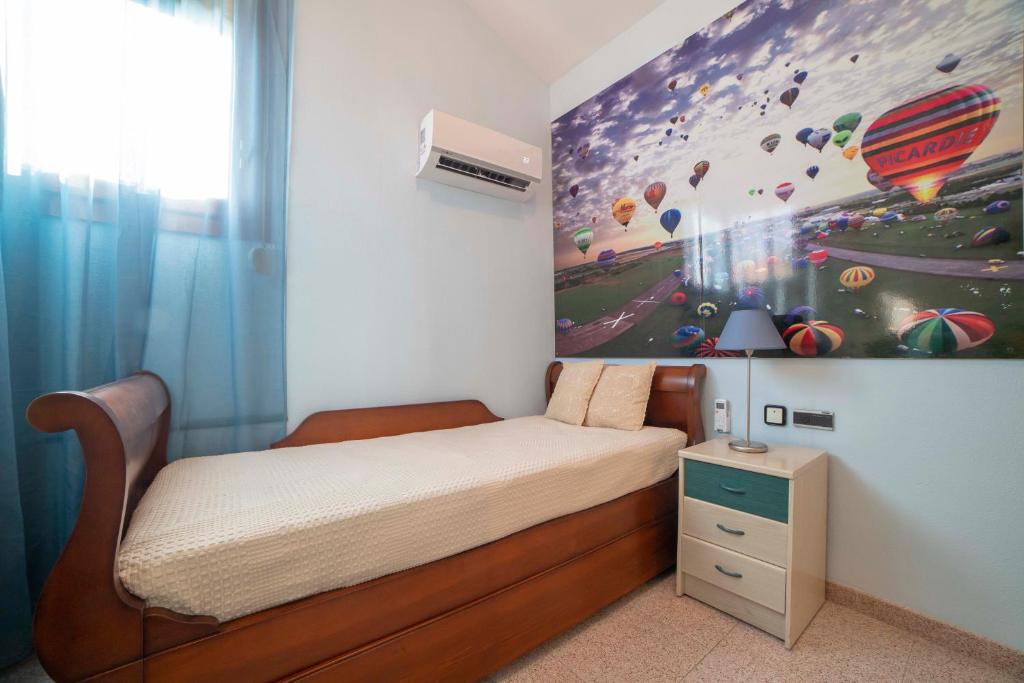 A bed or beds in a room at TurJalon - Apartamentos
