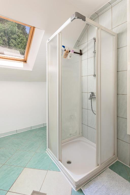 Koupelna v ubytování Apartmaji Trstenjak