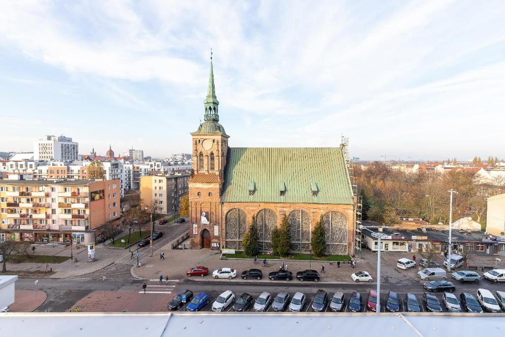 Nespecifikovaný výhled na destinaci Gdaňsk nebo výhled na město při pohledu z apartmánu