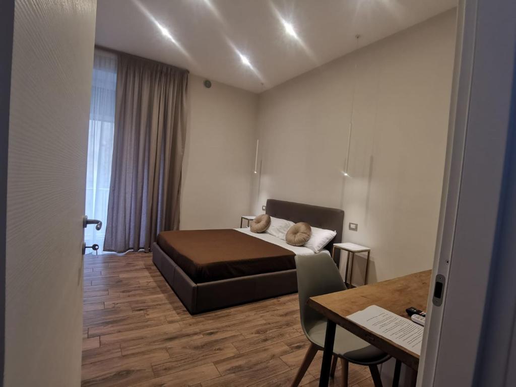 Postel nebo postele na pokoji v ubytování TOLEDO CLASS