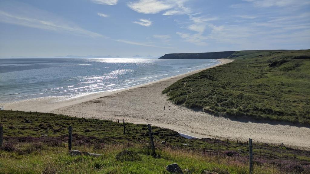 a view of a beach with the ocean at Remuera, North Tolsta in North Tolsta