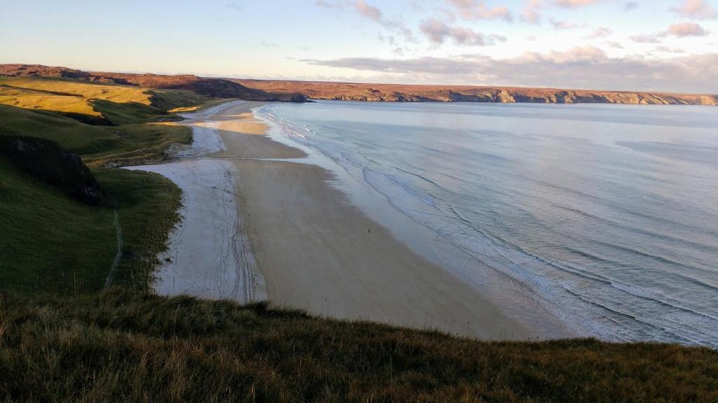 an aerial view of a beach with the ocean at Remuera, North Tolsta in North Tolsta