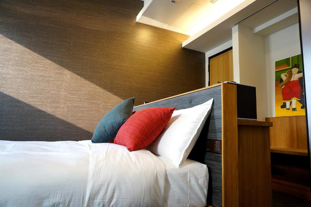 Postel nebo postele na pokoji v ubytování EG Hostel