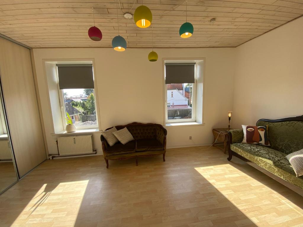 Posezení v ubytování N1 Apartment in the heart of Højer