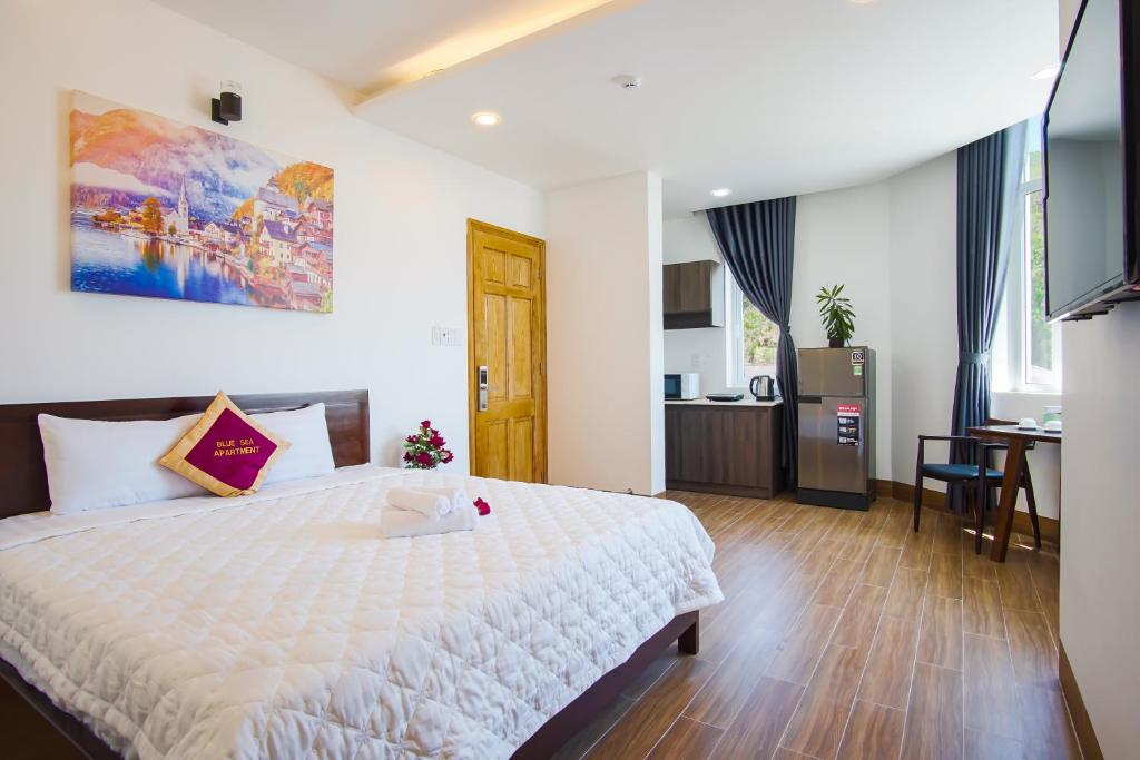 Giường trong phòng chung tại Blue Sea Luxury Hotel & Apartment Vũng Tàu