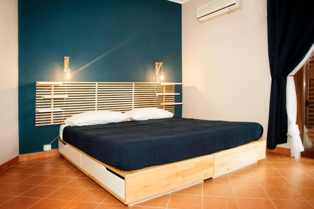 Postel nebo postele na pokoji v ubytování Casa Duci