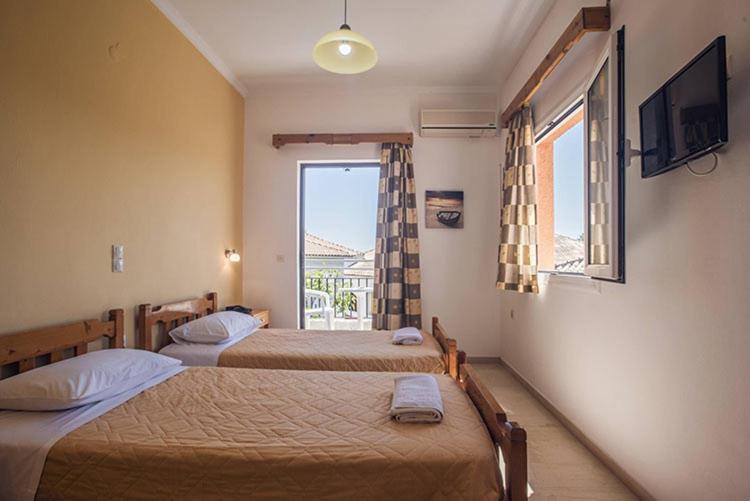 Postel nebo postele na pokoji v ubytování Hotel Omirico