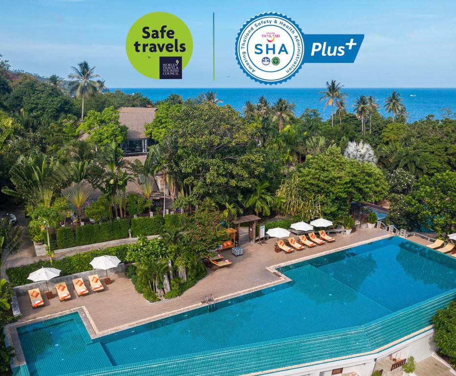 an image of a swimming pool at a resort with the words sale travels plus plus at Ban's Diving Resort SHA Extra Plus in Koh Tao